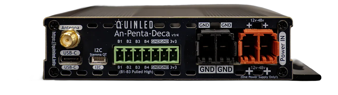 QuinLED An-Penta-Deca front panel head-on on white: SMA antenna, USB-C, I2C, green B1-B4 terminals, GND and orange 12-48V power inputs