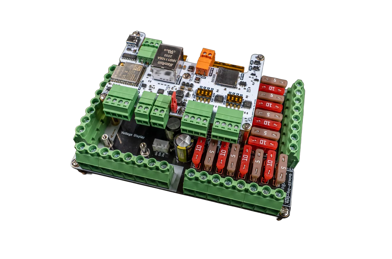 QuinLED Dig-Octa System top-down: white Brainboard with ESP32, Ethernet jack and green screw terminals stacked on a black fused Powerboard