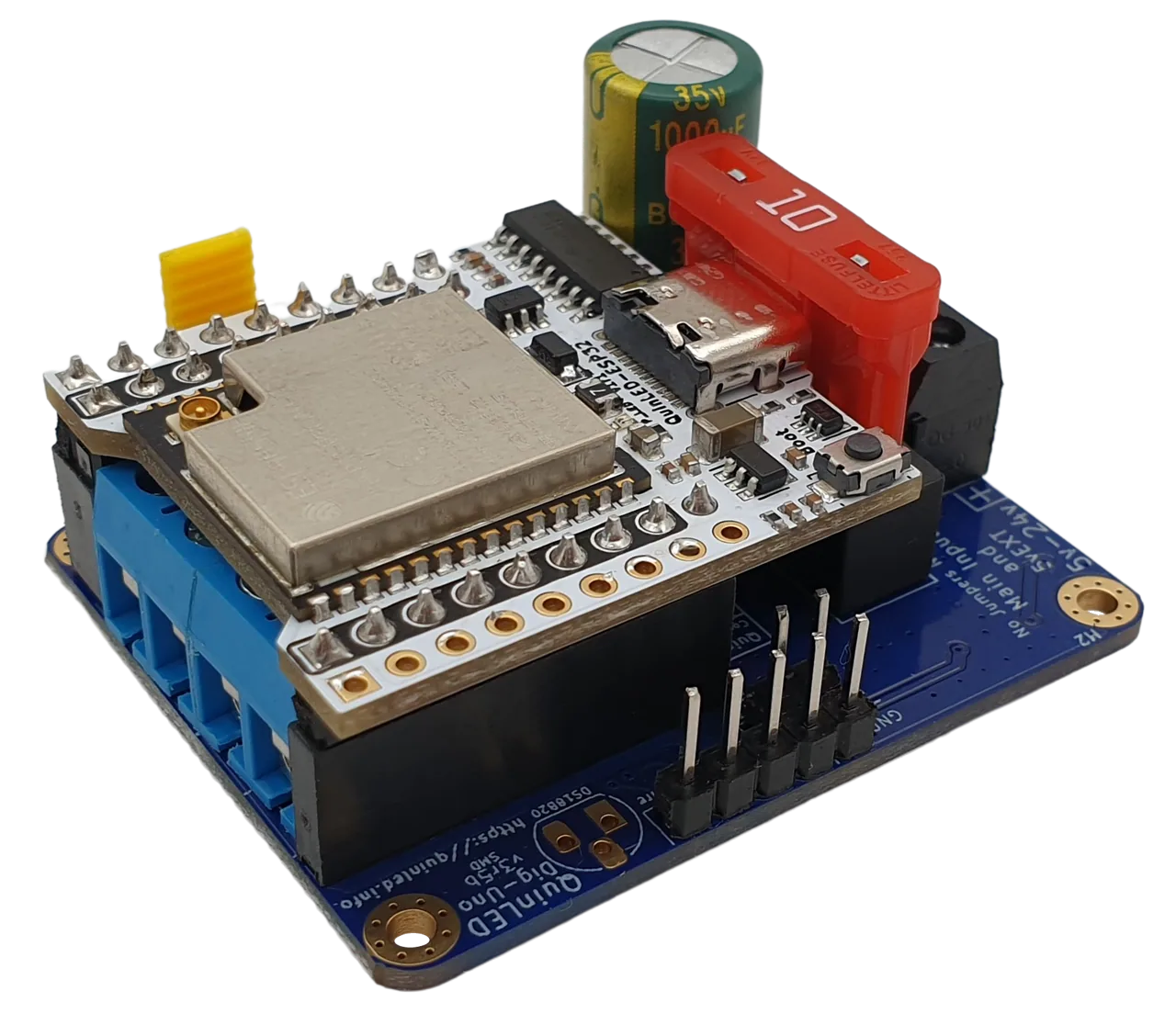 QuinLED Dig-Uno angled, ESP32 with USB-C, red blade fuse, capacitor, blue and black terminals, yellow jumper