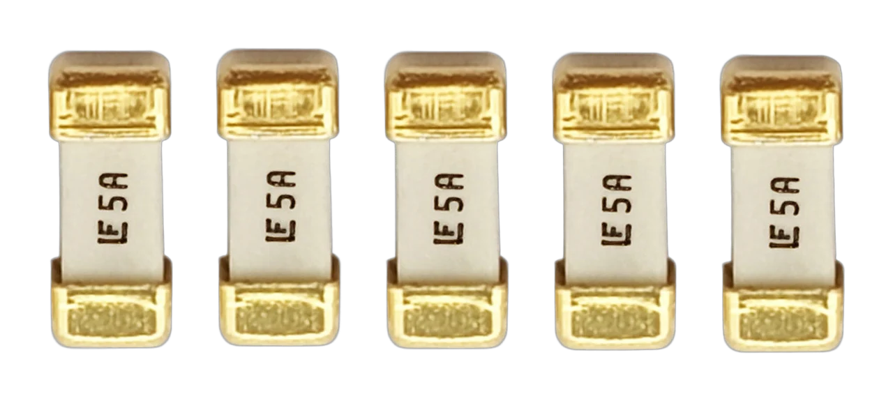 A QuinLED replacement fuse pack of five 5A 2410 SMD fuses with gold end caps