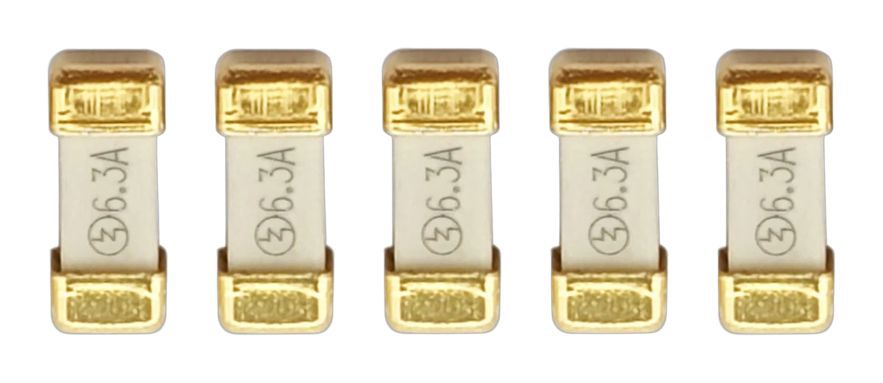 A QuinLED replacement fuse pack of five 6.3A 2410 SMD fuses with gold end caps